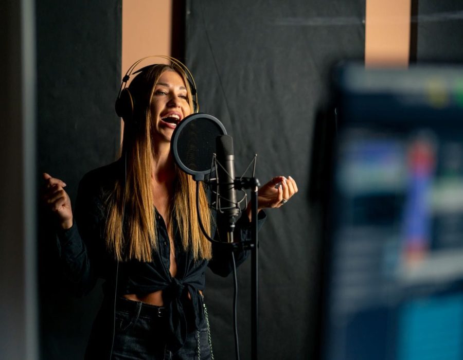 girl-singer-singing-in-a-recording-studio-with-hea-2024-12-02-11-52-43-utc girl-singer-singing-in-a-recording-studio-with-hea-2024-12-02-11-52-43-utc